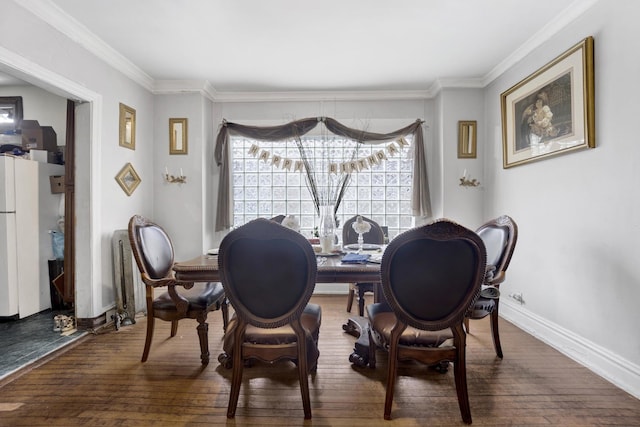 7515 S E End Ave, Chicago, IL 60649 - dining room with wood finished floors, ornamental molding, and radiator