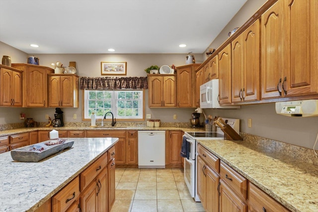 2598B County Road 600 E, Dewey, IL 61840 - kitchen featuring white appliances, light stone countertops, recessed lighting, and brown cabinets