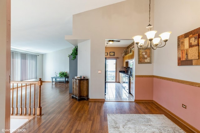 6713 181st St, Tinley Park, IL 60477 - unfurnished dining area with wood finished floors, a ceiling fan, and a chandelier