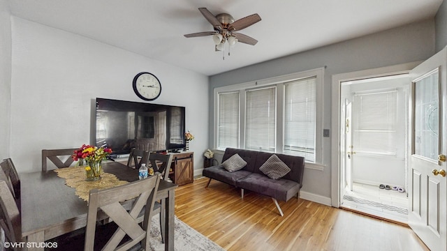 7318 W Archer Ave, Summit, IL 60501 - dining room with light wood-style floors and ceiling fan