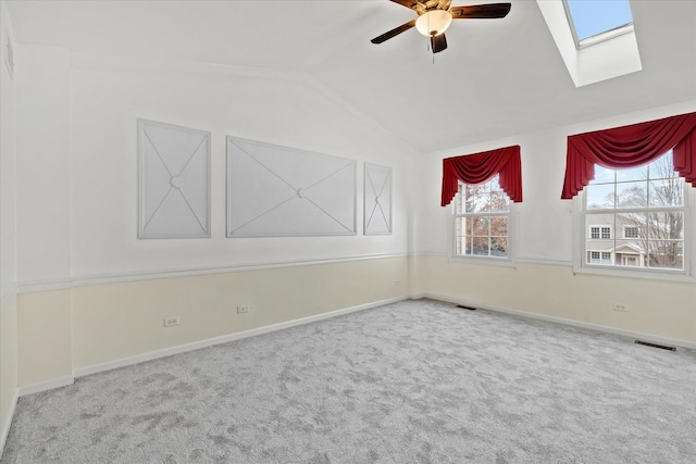 13261 Forest Ridge Dr Unit 0, Palos Heights, IL 60463 - unfurnished room with lofted ceiling, ceiling fan, carpet flooring, and a skylight