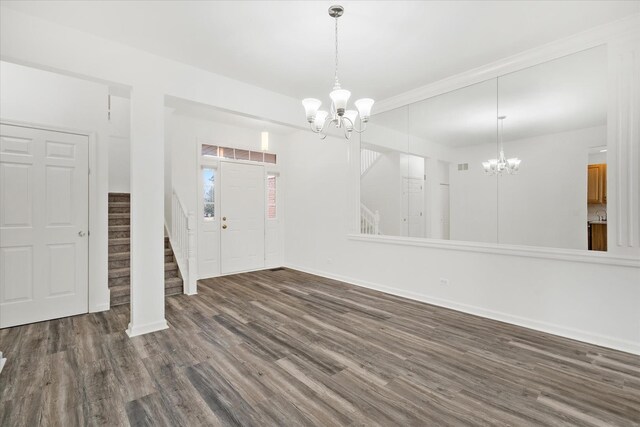 13261 Forest Ridge Dr Unit 0, Palos Heights, IL 60463 - foyer entrance featuring a chandelier, stairway, and wood finished floors