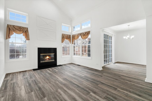13261 Forest Ridge Dr Unit 0, Palos Heights, IL 60463 - unfurnished living room featuring a chandelier, dark wood finished floors, high vaulted ceiling, and a fireplace with flush hearth