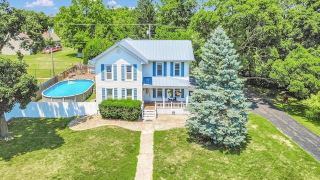 835 E Pells St, Paxton, IL 60957 - view of front facade featuring a metal roof and a porch