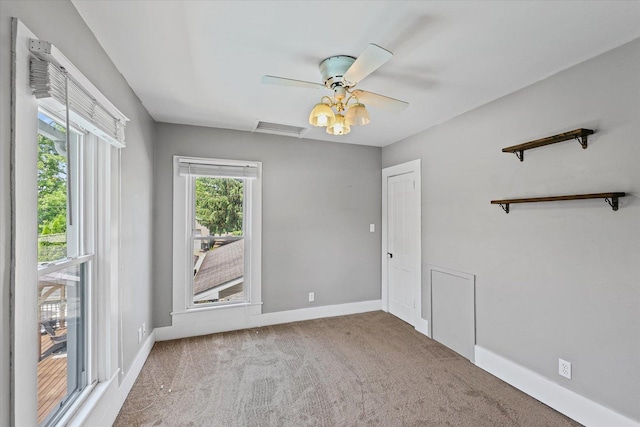 835 E Pells St, Paxton, IL 60957 - carpeted spare room with ceiling fan and baseboards