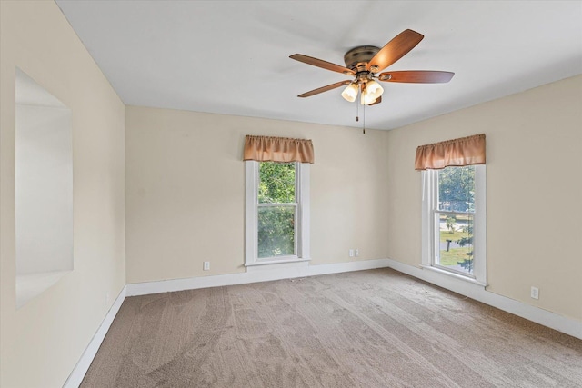 835 E Pells St, Paxton, IL 60957 - unfurnished room featuring healthy amount of natural light, carpet flooring, and a ceiling fan