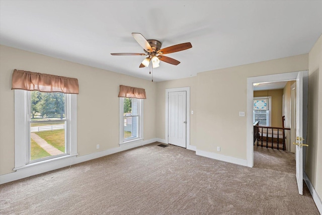 835 E Pells St, Paxton, IL 60957 - unfurnished room with a ceiling fan and carpet