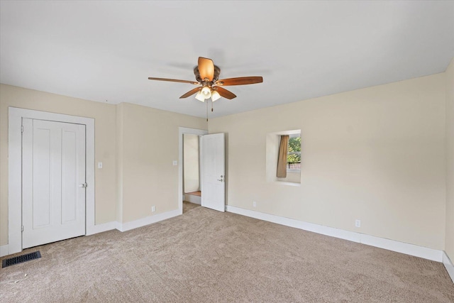 835 E Pells St, Paxton, IL 60957 - unfurnished bedroom featuring carpet floors and ceiling fan