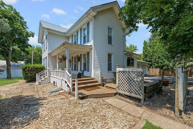 835 E Pells St, Paxton, IL 60957 - rear view of house with a porch