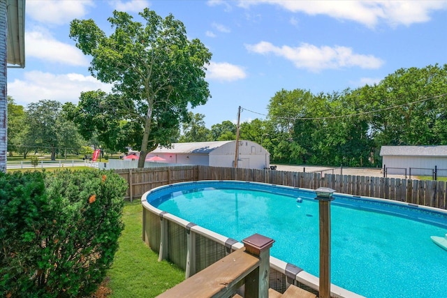 835 E Pells St, Paxton, IL 60957 - view of pool featuring a fenced backyard and view of wooded area