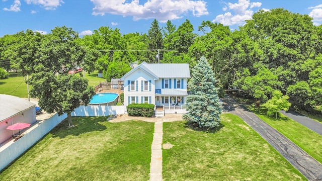 835 E Pells St, Paxton, IL 60957 - view of front of house with a porch and a metal roof