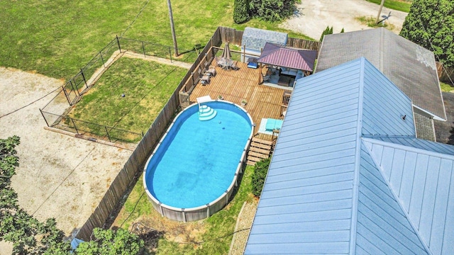 835 E Pells St, Paxton, IL 60957 - view of pool with a fenced backyard and a wooden deck