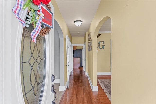835 E Pells St, Paxton, IL 60957 - corridor with arched walkways and wood finished floors
