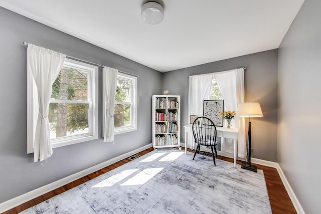 653 Blackstone Pl, Highland Park, IL 60035 - sitting room with baseboards and wood finished floors