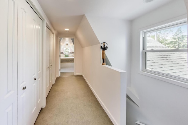 653 Blackstone Pl, Highland Park, IL 60035 - hall with light colored carpet and an upstairs landing