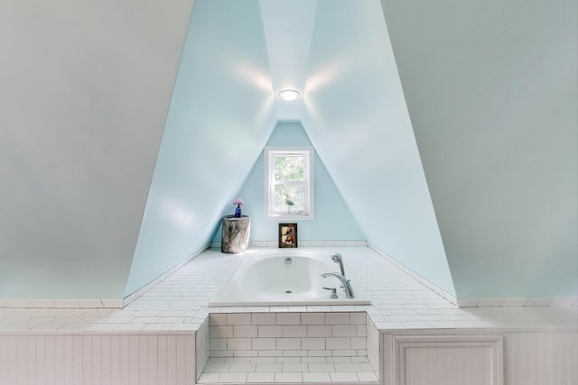 653 Blackstone Pl, Highland Park, IL 60035 - full bathroom featuring a bath and vaulted ceiling