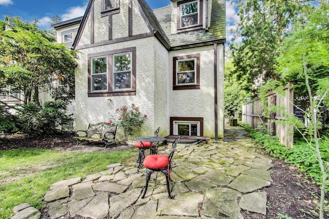 653 Blackstone Pl, Highland Park, IL 60035 - back of house with a patio area and stucco siding