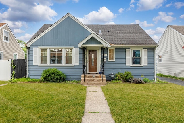 9116 S 53rd Ct, Oak Lawn, IL 60453 - bungalow-style home featuring a shingled roof