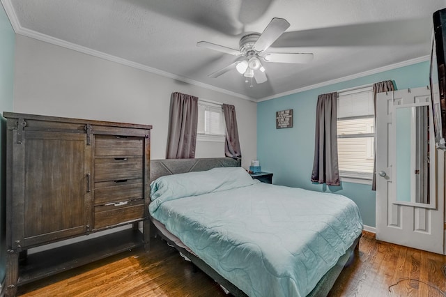 9116 S 53rd Ct, Oak Lawn, IL 60453 - bedroom with wood finished floors, crown molding, and ceiling fan