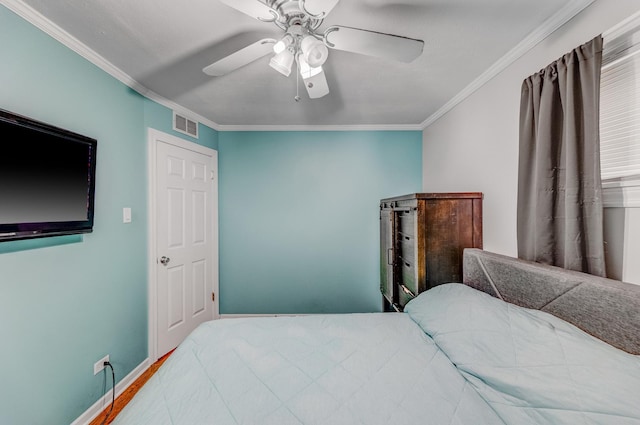9116 S 53rd Ct, Oak Lawn, IL 60453 - bedroom featuring crown molding, a ceiling fan, and wood finished floors