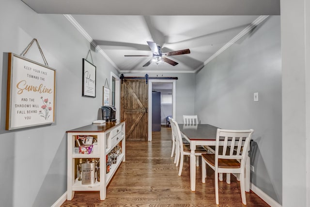 9116 S 53rd Ct, Oak Lawn, IL 60453 - dining area featuring a barn door, wood finished floors, ornamental molding, and ceiling fan