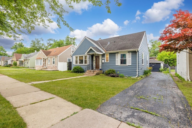 9116 S 53rd Ct, Oak Lawn, IL 60453 - view of front of home with a shingled roof, an outdoor structure, and a detached garage