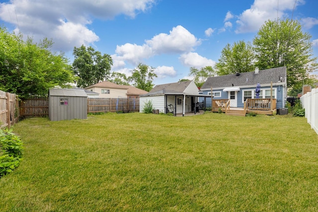 9116 S 53rd Ct, Oak Lawn, IL 60453 - fenced backyard featuring a wooden deck and a storage unit