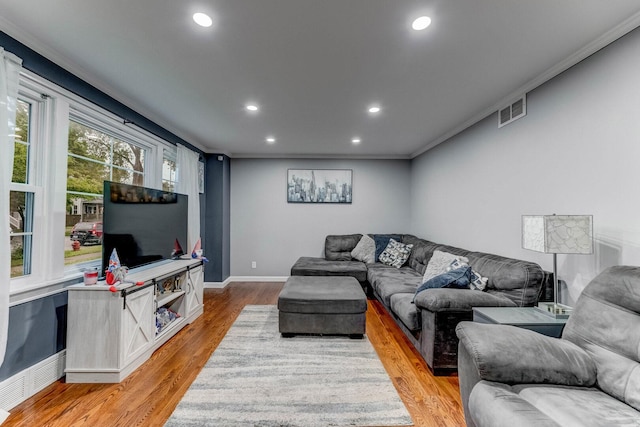 9116 S 53rd Ct, Oak Lawn, IL 60453 - living room featuring recessed lighting, light wood-style flooring, and crown molding
