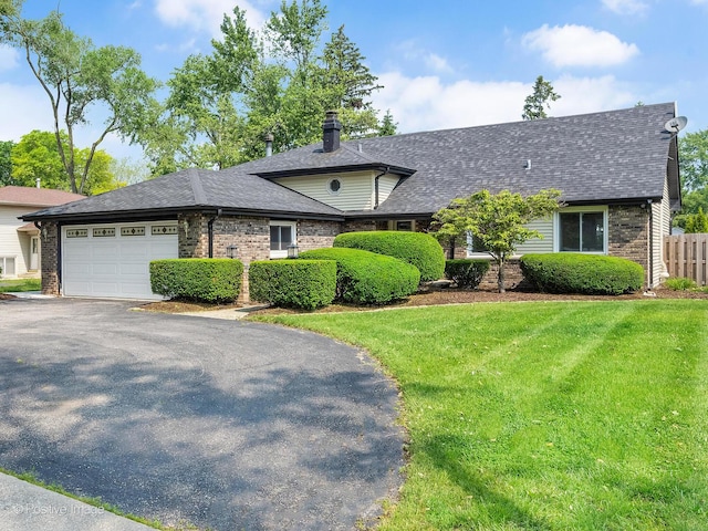 624 63rd St, Downers Grove, IL 60516 - view of front facade with a garage, brick siding, driveway, a chimney, and a shingled roof
