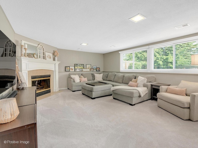 624 63rd St, Downers Grove, IL 60516 - living room featuring carpet flooring, a fireplace, and a textured ceiling