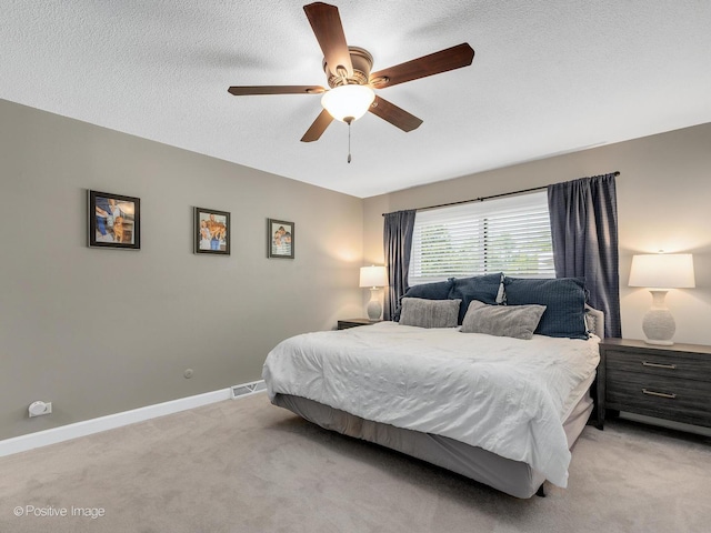 624 63rd St, Downers Grove, IL 60516 - bedroom featuring light carpet, a ceiling fan, and a textured ceiling