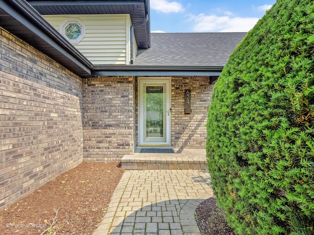 624 63rd St, Downers Grove, IL 60516 - view of exterior entry with brick siding and a shingled roof