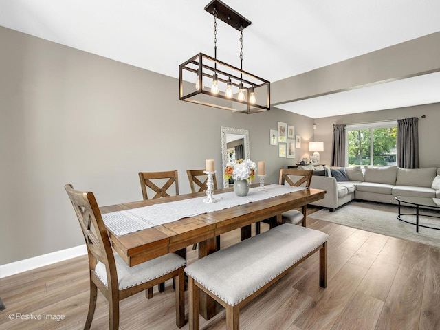 624 63rd St, Downers Grove, IL 60516 - dining space featuring light wood finished floors and a chandelier