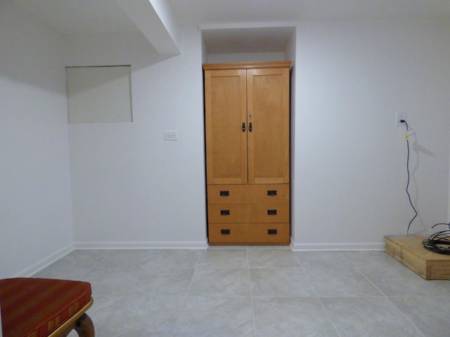 432 Thunder Rdg, Lake In The Hills, IL 60156 - unfurnished bedroom with light tile patterned floors and baseboards
