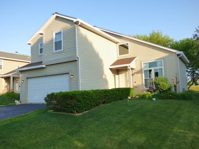 432 Thunder Rdg, Lake In The Hills, IL 60156 - traditional-style house with a garage, a front lawn, and asphalt driveway