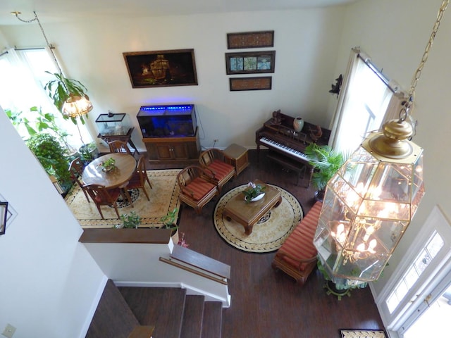 432 Thunder Rdg, Lake In The Hills, IL 60156 - living room with wood finished floors, plenty of natural light, stairs, and a chandelier