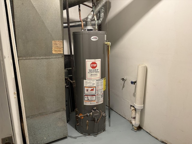2841 10th St, Rockford, IL 61108 - utility room with gas water heater and heating unit