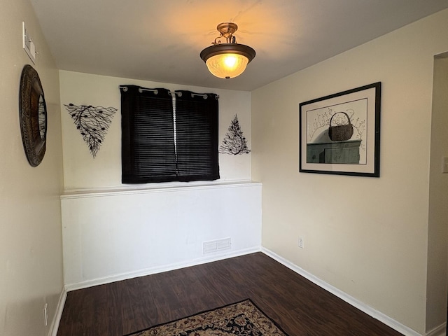 2841 10th St, Rockford, IL 61108 - unfurnished room featuring baseboards and wood finished floors