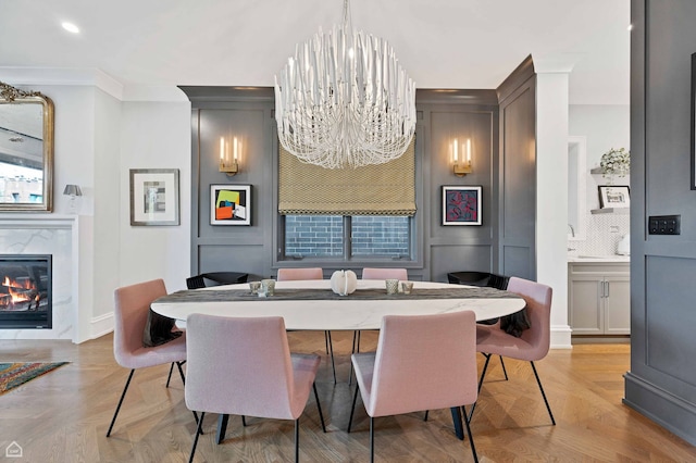 1469 W Byron St Unit 2, Chicago, IL 60613 - dining space featuring a chandelier, ornamental molding, a premium fireplace, and recessed lighting
