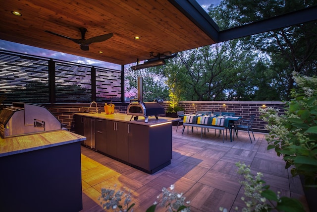 1469 W Byron St Unit 2, Chicago, IL 60613 - view of patio with an outdoor kitchen, a bar, and an outdoor hangout area