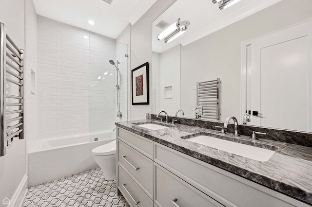 1469 W Byron St Unit 2, Chicago, IL 60613 - bathroom featuring a towel warming rack, washtub / shower combination, double vanity, recessed lighting, and radiator heating unit