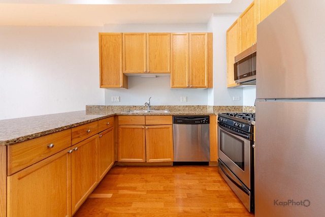 1464 S Michigan Ave Unit 1108, Chicago, IL 60605 - kitchen with stainless steel appliances, light wood-type flooring, and light stone counters
