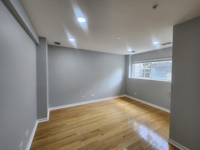 746 River Mill Parkway, Wheeling, IL 60090 - unfurnished room featuring light wood-style floors, fire sprinkler in ceiling, and recessed lighting