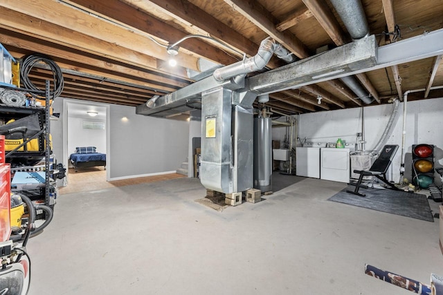 2110 Joanna Ave, Zion, IL 60099 - unfinished below grade area featuring washer and dryer and heating unit