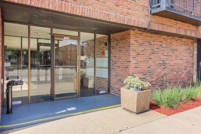 7904 W N Ave Unit 605E, Elmwood Park, IL 60707 - doorway to property with brick siding