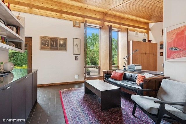 41W955 Northway Dr, Elburn, IL 60119 - living room featuring a wood ceiling with exposed beams and dark tile patterned floors
