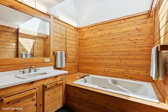 41W955 Northway Dr, Elburn, IL 60119 - bathroom featuring wood walls, vanity, and a tub to relax in