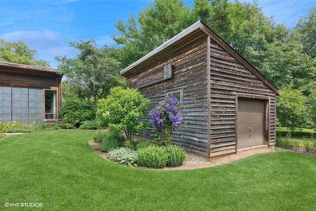 41W955 Northway Dr, Elburn, IL 60119 - view of home's exterior featuring an outdoor structure and a lawn
