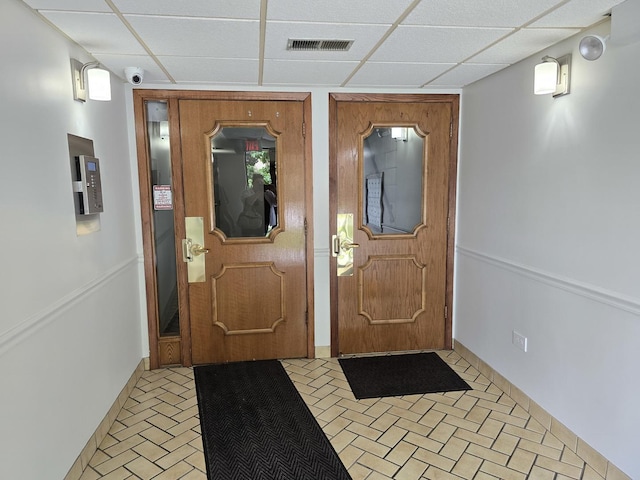 1441 E Thacker St Unit 501, Des Plaines, IL 60016 - foyer with a paneled ceiling and brick patterned flooring
