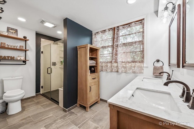 8920 Mcvicker Ave, Morton Grove, IL 60053 - full bathroom featuring double vanity, a stall shower, and recessed lighting